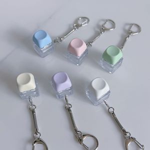 31 Diseños Mini Teclado Fidget Toy Llaveros Redondos con Teclas Antiestrés para Niños y Adultos - Product Image 3