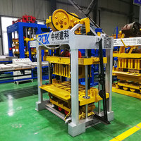 Machine à fabriquer des blocs interverrouillés et creux QTJ4-40 avec PLC et pompe pour briques en ciment