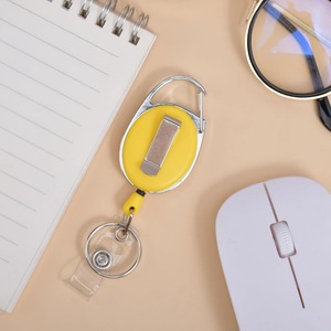 Wholesale stock of retractable oval <b>buckles</b> with back <b>clips</b>, solid color badge scrolls, name tag <b>clips</b>, and egg-shaped - Product Image 3