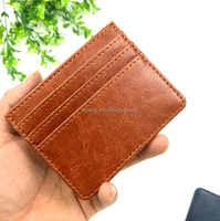 Titulaire de la carte-cadeau PU de luxe classique de haute qualité Titulaire de la carte de crédit RFID mince avec logo personnalisé Produit de dépôt en gros