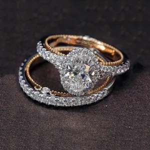 新款白色钻石订婚戒指套装金色椭圆形鸡蛋戒指长方形