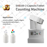 Compteur de comprimés et de capsules automatique à rotation de plaque DXS100-2