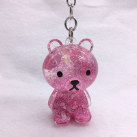 Nouveau design créatif mignon en gros porte-clés en acrylique liquide ours brun de dessin animé avec flotteur 3D OEM ODM disponible cadeau souvenir