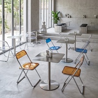Moderne Industrielle Freizeitmöbel, Edelstahltische, Sitzgruppen und Tragbare Acryl-Klappstühle für Cafés