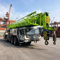 Grue mobile hydraulique d'occasion 100t, flèche 6 sections 60,5m, châssis 8x4, poids de transport 50t pour la construction municipale