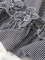 Robe sans manches à carreaux noirs et blancs pour femmes, nouvelle robe midi en polyester à volants et appliques florales, coupe trapèze