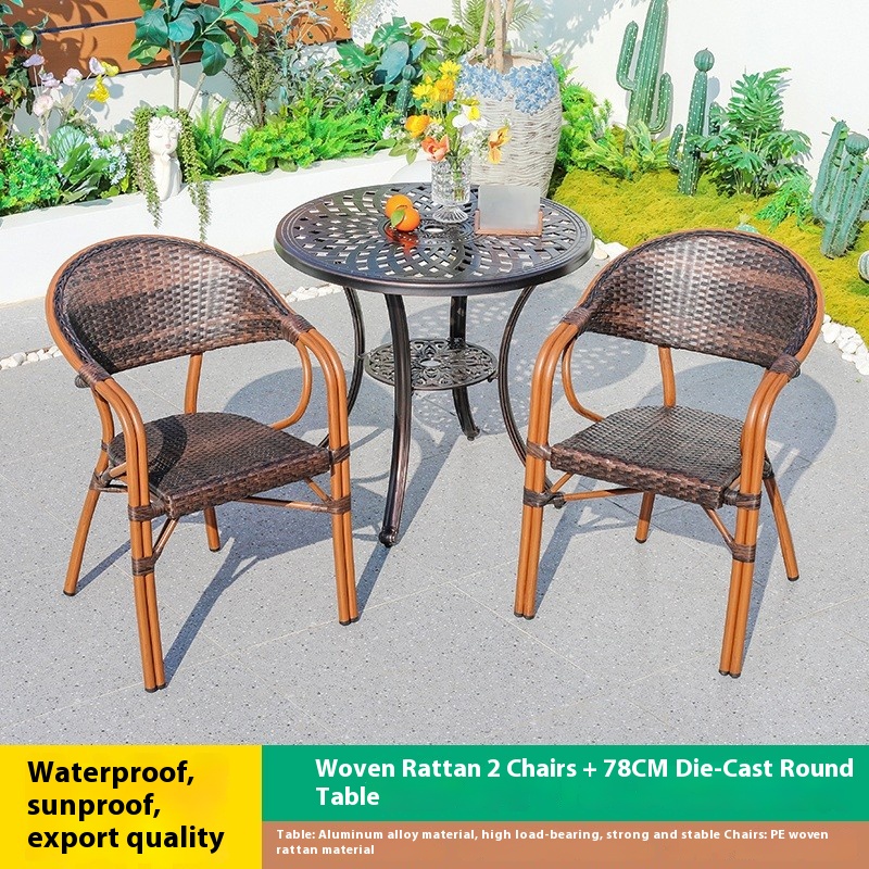 Mesa redonda de fundición a presión de 78 cm con 2 sillas de ratán
