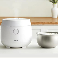 Cuiseur à riz électrique à écran tactile rond 3L avec couvercle détachable en acier inoxydable pour la cuisine domestique.