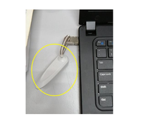 Lecteur et étiquette d'identification RFID pour ordinateur portable