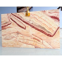 Dalles de marbre Onyx Rouge Royal en pierre naturelle, très demandées en 2026, pour revêtements muraux et de sol, et projets de décoration intérieure
