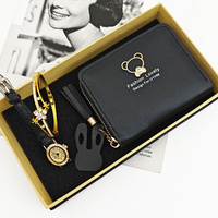 Set Jam Tangan Wanita Mewah dengan Casing Oval, Dial Angka Arab, Tali Kulit, Gelang Bunga, dan Dompet Pendek dalam Kotak Hadiah
