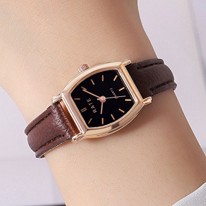 Nouvelle montre élégante pour femme avec un design minimaliste en forme de barillet et un bracelet en cuir. - Product Image 4