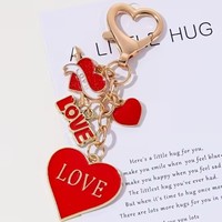 Nouveau porte-clés créatif en alliage de zinc en forme de cœur, pendentif fleur rose de luxe pour femmes et filles, idée cadeau Saint-Valentin pour sac et voiture