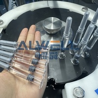 Machine de remplissage et de bouchage automatique électrique pour seringues préremplies d'acide hyaluronique à haute viscosité