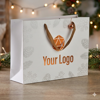 Sac d'emballage en carton écologique 2026 pour cadeaux de Noël avec logo personnalisé, matériaux recyclés, design pliable pour l'emballage de bougies