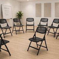 Chaise de bureau pliable en PP de haute qualité, design creux respirant, empilable, en plastique, pour salle de conférence