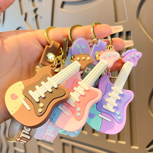 Mát phim hoạt hình guitar PVC keychain sáng tạo ánh sáng mặt dây chuyền nhựa cho các cặp vợ chồng bán buôn sáng tạo cá tính Keychain - Product Image 2