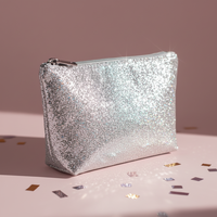 Pochette cosmétique argentée métallisée brillante avec surface pailletée, trousse de maquillage pour femmes, idéale pour les soirées