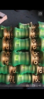 Vente directe usine SK100 SK200 Pièces de rechange pour excavatrice Rouleau de chenille de bulldozer Rouleau porte-chaîne Rouleau de chenille