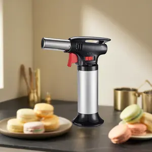 Portable custom kitchen torch for baking creme brulee with a butane flame torch lighter