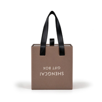 Boîte cadeau rigide marron personnalisée avec poignée, boîte en papier rigide de luxe avec poignée en ruban pour l'emballage de cadeaux cosmétiques