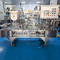 Machine de remplissage scellage de tasses en plastique Machine d'emballage et de remplissage de tasses de glace de sauce liquide jus lait