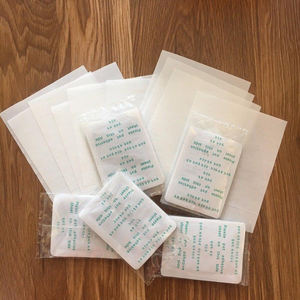 Kinoki10pcsパッド10pcs KinokiDetoxフットパッチパッド体毒足痩身クレンジングハーブ接着剤ホットフットマッサージャー - Product Image 5