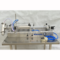 Remplisseuse horizontale pneumatique à tête unique pour liquides