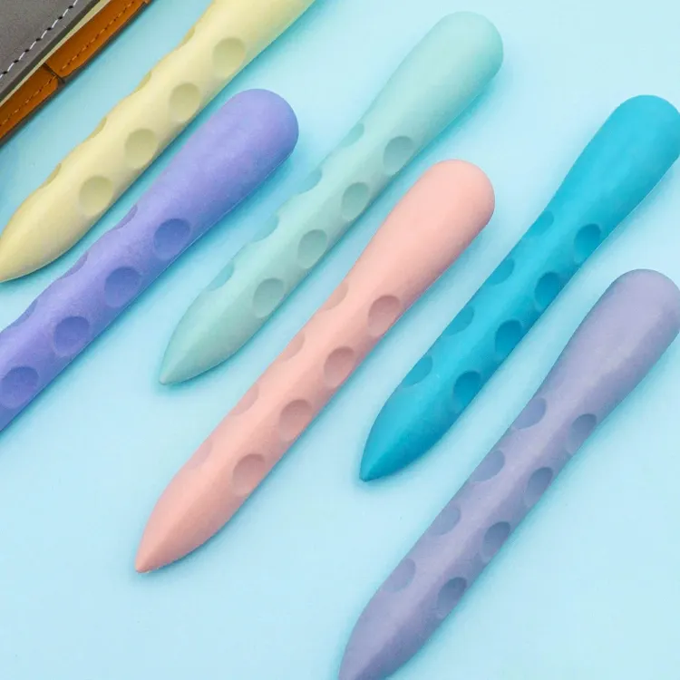 Nuevo diseño Macaron Color Crayon Shape TPR Material Goma de borrar para niños