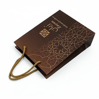 Sac en papier personnalisé avec logo imprimé, sac de luxe pour bijoux avec poignée en corde de coton, vente en gros pour emballage cadeau de bijoux et vente au détail