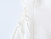 Nouvelle robe mini décontractée et élégante pour femme 2026, avec nœud latéral décoratif, style rétro chic sans manches et coupe ajustée.