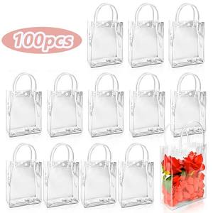100 Bolsas de Regalo de <span class=keywords><strong>PVC</strong></span> Transparente Premium, Bolsas de Mano Transparentes con Asas Resistentes para Bodas, Fiestas, Baby Showers y Eventos - Product Image 1