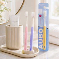 Brosse à dents ergonomique en PP sans BPA avec poils PBT doux de qualité supérieure pour l'hygiène bucco-dentaire à usage quotidien à la maison