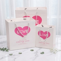 Sac en papier couché de style élégant pour mariage, artisanat, cadeau, impression offset, taille personnalisée, emballage carton jetable, logo personnalisé