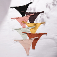 Vente chaude : Culotte string brésilienne pour femme, sans couture, dos en T, taille basse, avec décoration anneau métallique, couleur nude