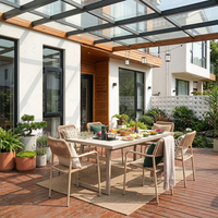 Table de restaurant extérieure en métal avec barbecue ou plaque de cuisson, ensemble table et chaises pour patio, jardin, ou terrasse.