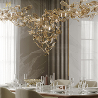 Lustre en verre contemporain personnalisé en forme de feuille pour la décoration intérieure du salon, de la salle à manger et des escaliers