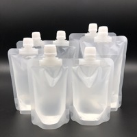 Vente en gros de pochette vide en plastique pour emballage de boisson liquide avec bec verseur 50 100ML PE pochette transparente avec bec verseur