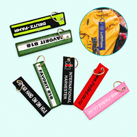 Porte-clés promotionnel en tissu, étiquette d'aviation personnalisée brodée avec logo sur bordure Merrow