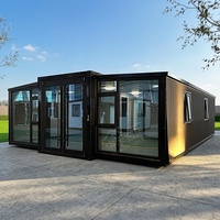 Maison conteneur à structure en acier galvanisé, unité préfabriquée mobile compacte avec mur-rideau en verre et revêtement PVC pour complexe hôtelier, bureau, camping