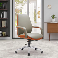 Chaise de bureau relaxante pour personnel de studio Chaise de visiteur en cuir artificiel à dossier court orange coloré pour le bureau
