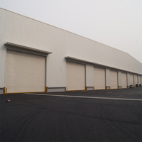 Porte à enroulement automatique industrielle en acier QJ-8, certifiée CE, antivol, 12m*12m, électrique, vente en gros directe usine Chine