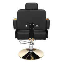 Le fauteuil de mobilier de salon de coiffure haut de gamme peut pivoter et soulever un fauteuil de barbier en métal noir en acier inoxydable