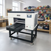 Imprimante DTG numérique rapide I3200 à deux têtes d'impression format A3, fabriquée en Chine, prix d'usine, pour l'impression directe sur t-shirts, vêtements et textiles en couleur.