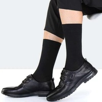 Chaussettes longues décontractées pour hommes, extra-longues, épaisses, noires, montantes, printemps-été, taille haute, absorbant la transpiration, en polyester, couleur unie