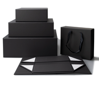 Scatola di immagazzinaggio pieghevole d'imballaggio magnetica del bollettino del regalo di carta nera del cartone di lusso Premium su ordinazione all'ingrosso per i vestiti delle scarpe