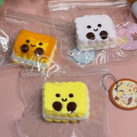 Jouet sensoriel anti-stress en silicone de qualité alimentaire en forme de biscuit sandwich, rembourré de crème, avec visage mignon, souple et compressible, idéal pour la vente en gros