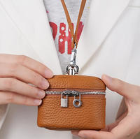 Nouvelle pochette souple à suspendre au cou pour pièces de monnaie, étui de rangement en cuir pleine fleur, mini sacs de voyage personnalisés à fermeture éclair ronde pour rouge à lèvres et maquillage