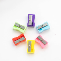 Taille-crayon en plastique à trou unique en gros, logo personnalisé, portable, fournitures scolaires, fournitures de bureau, outil de papeterie de bureau