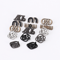 Étiquette métallique découpée au laser sur mesure, plaquée or, écologique, gaufrée 3D, motifs personnalisés tendance, rectangulaire/ovale, pour vêtements de marque
